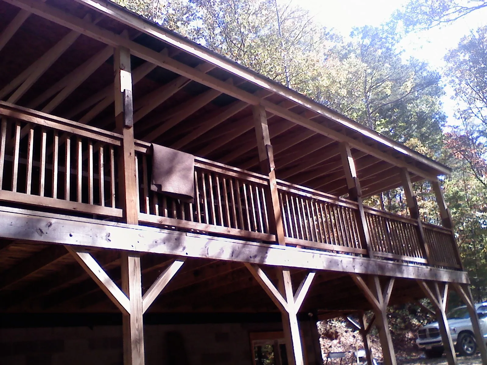 Timber framing under a new elevated porch and deck — Roof Leak Repair in Allison Park by Roofing Brothers